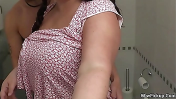 Busty bitch sucks and rides cock in the restroom