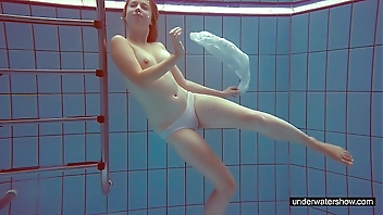 Cute Melissa plays underwater