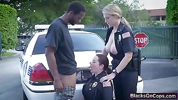 Nasty and busty police whores fucked hard by a black guy they arrested