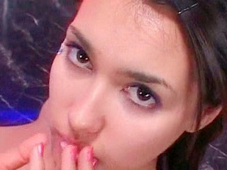 Nippon babe sucking a large member for naughty XXX pleasure